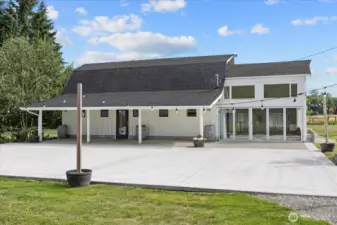 Barn-style pole building with expansive patio for weddings, events, pickleball court, etc.!