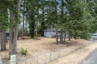 There is plenty of room to roam on this 1/4  acre - corner lot! Dual back gate for easy access to the property.