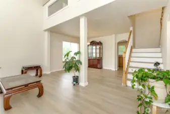 Upon entry your greeted by soaring ceilings and the formal living and dining room
