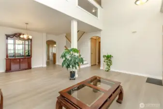 Upon entry your greeted by soaring ceilings and the formal living and dining room
