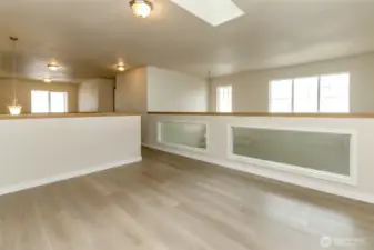Spacious light filled loft overlooking living room