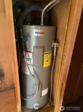Interior cabinet with water heater