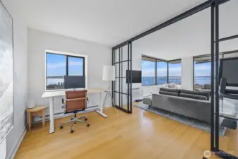 Separation of living room offers flex space for office, guests or workout.