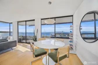 Stunning space with expansive views leads to sprawling deck - expanding living space.