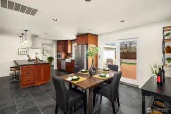 Good sized dining area with sliding doors to the oversized entertaining deck.