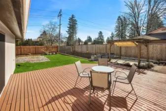 The large entertaining deck can be accessed both from the bonus room, or the kitchen / dining area. Perfect for grilling on a hot summers day, and entertaining a crowd