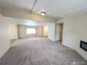 Vaulted family room is spacious.