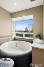 Hot tub can stay or go. Also a great location for a freestanding tub. Imagine these views!