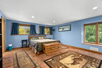 There are stairs from the hallyway that lead up here to the primary bedroom that is very large and has its on ensuite to include a bathroom, walk in closet and a den or sitting room area.