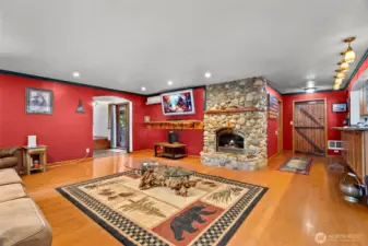 Downstaris living room is right next to the kitchen