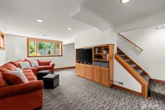 Lower Level Bonus Room has built in cabinets & Full size window