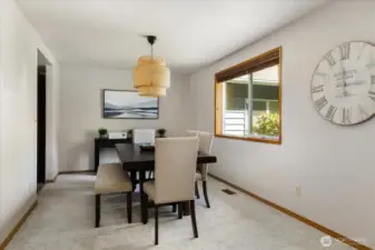 With easy access to the kitchen or family room, the dining room is perfectly positioned.