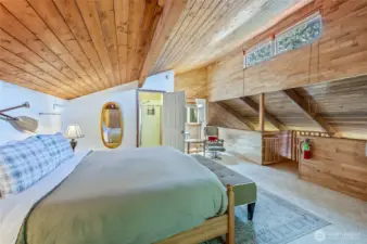 Primary loft offers privacy and stunning views from above.