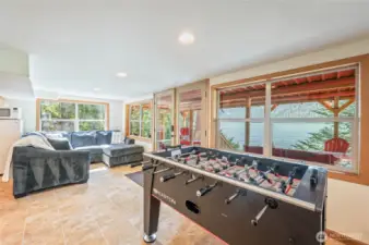 Foosball table and bar area add fun and flair to the finished basement.