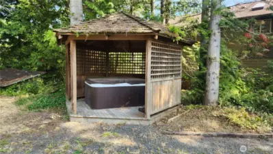 Gazebo with hot tub, needs some TLC