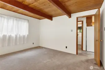 Bedroom leading to laundry room