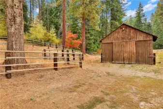 Barn with hay storage and feeding troughs