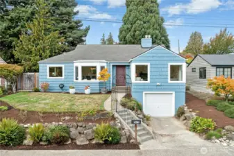 Commanding presence above quiet tree-lined street