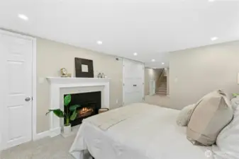 Downstairs primary bedroom has gas fireplace. (Could also be guest suite/home office/family room).