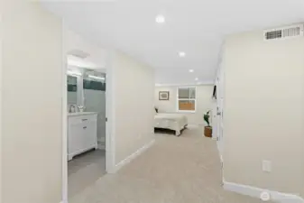 Large closet in hallway outside bedroom. New lush carpeting.  Extra torage with pulldown stairs.