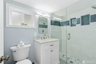 Brand new three-quarter bath downstairs next to bedroom.