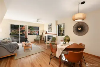 Spacious living/dining with fireplace and LVP flooring