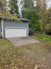 Enjoy the convenience of this spacious two-car garage, perfectly connected to the home for easy access and added comfort.