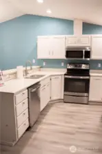 This lovely kitchen features stainless steel appliances that are perfect for the home and are built to last.