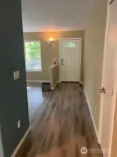 This is the hallway that connects the living room to the kitchen, dining room and family room.