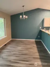 Welcome to the inviting dining area, a perfect space to enjoy delicious meals and good company. This charming setting promises a delightful dining experience every time you visit.