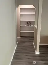 The hallway flows seamlessly into the bedroom, creating a welcoming path that invites relaxation.