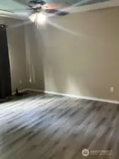 Spacious and stunning primary bedroom features a walk-in closet, perfect for relaxing and unwinding in style.