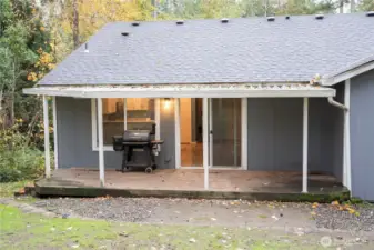 Spacious backyard deck perfect for entertaining guests and enjoying outdoor gatherings.