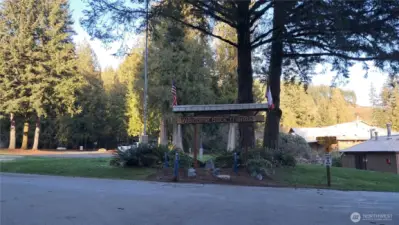 By main gate of community