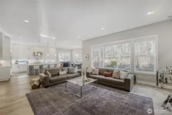 The spectacular gourmet kitchen seamlessly connects to gatherings in the Great room, dining space, and backyard patio. Thoughtfully curated details throughout make this home a standout.