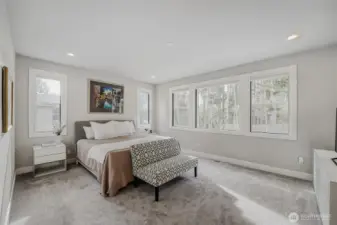 The expansive Primary Suite provides a relaxing, private escape, secluded from the rest of the home.