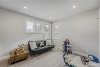 The fifth bedroom on the upper floor makes a terrific play/flex room with a walk-in closet for additional storage.