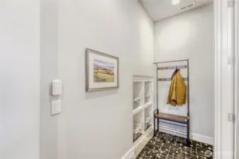 A perfect drop zone/mud room welomes you home through the garage entry. A large coat closet is around the corner.