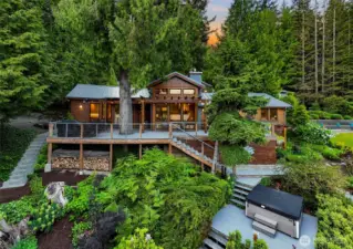 Lakeside, waterfront living on a double lot with 2 separate water rights.