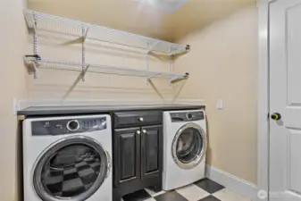 Ample laundry room off of garage