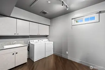 The biggest condo laundry room ever. Seller used it as a second office too.