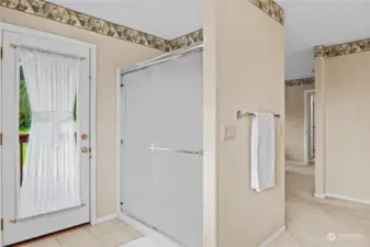 Shower with door to small deck