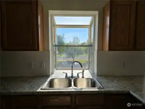 Bay window behind sink