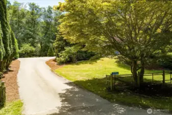 Lovely driveway entrance to your new Leroy Circle home.