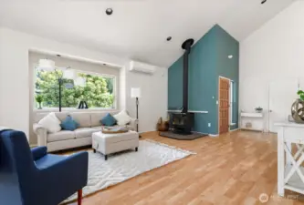 Wood stove can create such a lovely warm room - and the split mini - brings heat and cool air when needed to your expansive space.