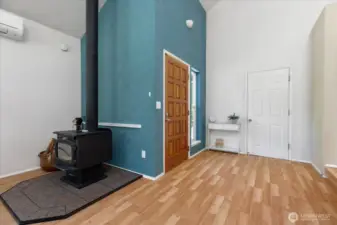 White door in the front of picture goes to the 1 car garage.