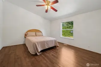 Spacious Primary Bedroom with ceiling fan