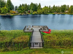 Balcony overlooks your own dock and sparkling lake.