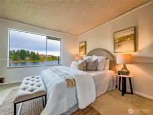 Wake up to serene waterfront views right from your bed.