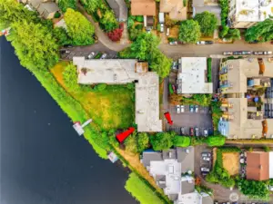 Aerial view showcasing the top-floor unit along with assigned parking spaces 2 and 3.